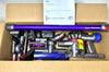 Dyson vacuum cleaner parts and accessories in a cardboard box